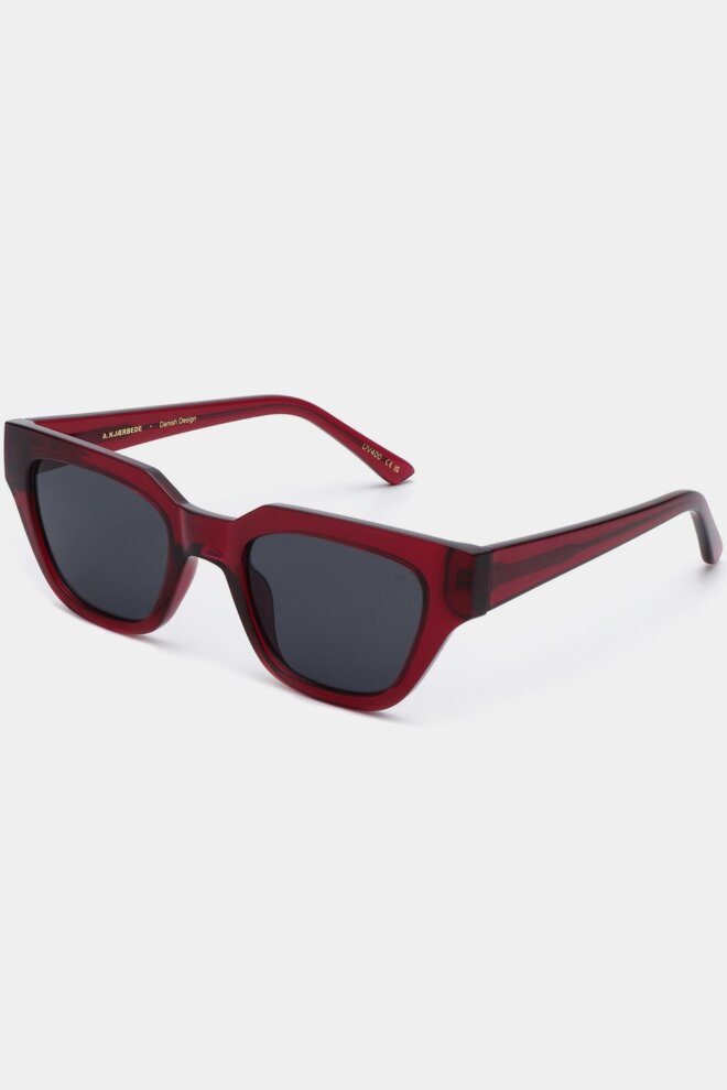 SONNENBRILLE KAWS BURGUNDY TRANSPARENT