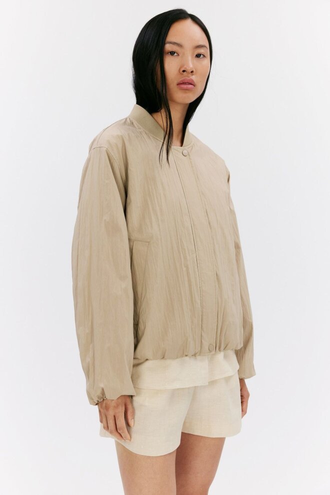JACKE EVELIN SAND